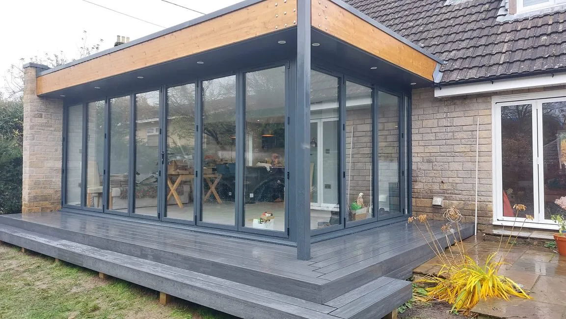 A house with a deck and a patio.